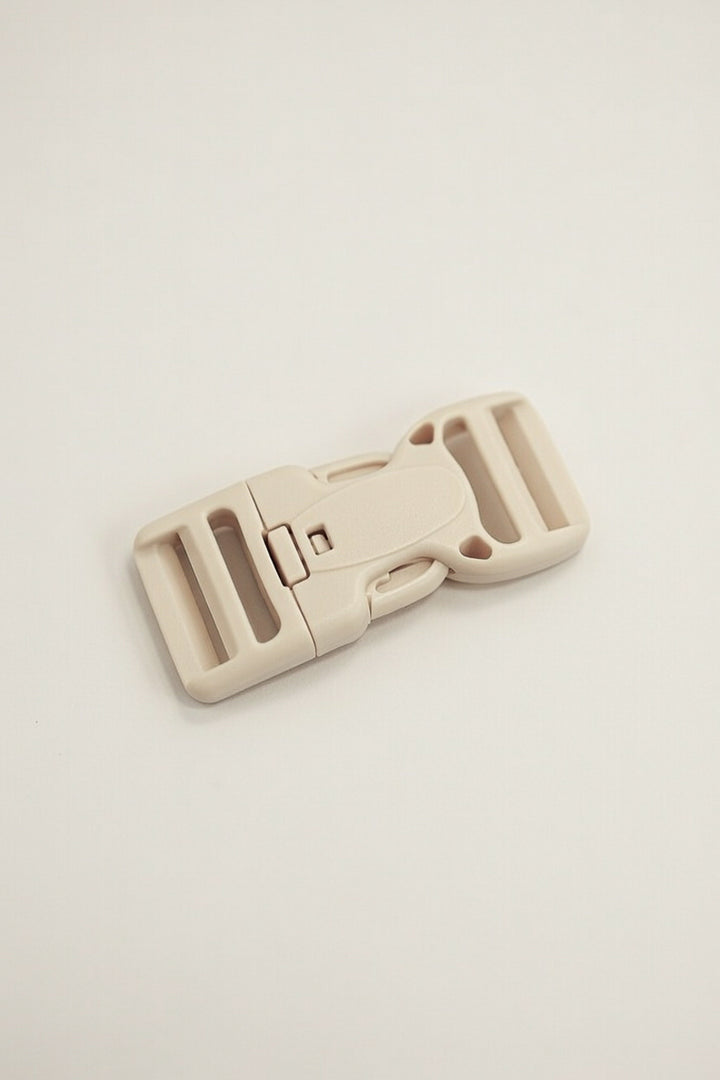 Gesp met veiligheidsknoop 25 mm beige